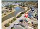 Beautiful aerial view of the home and nearby walking trails, pond, and surrounding community at 301 Forsythia Ave, Summerville, SC 29483