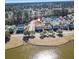 Gorgeous aerial showcasing the home and surrounding pond at 301 Forsythia Ave, Summerville, SC 29483