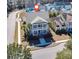 Great aerial view showcasing the home and its manicured lawn at 301 Forsythia Ave, Summerville, SC 29483