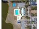 A community aerial view showing a pool, basketball court, playground, and nearby neighborhood at 301 Forsythia Ave, Summerville, SC 29483