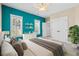 Bright bedroom with ample closet space and modern accents create a stylish retreat at 301 Forsythia Ave, Summerville, SC 29483