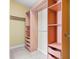 A walk-in closet with built in shelving and drawers maximizes storage and organization at 301 Forsythia Ave, Summerville, SC 29483