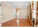 Spacious dining room with hardwood floors, chandelier lighting, and ample natural light at 301 Forsythia Ave, Summerville, SC 29483