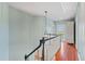 A hallway bathed in natural light leads to the upper floor, creating an inviting path at 301 Forsythia Ave, Summerville, SC 29483
