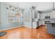This kitchen offers a stainless dishwasher, white cabinetry, and island at 301 Forsythia Ave, Summerville, SC 29483