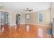 Unfurnished living room showcases hardwood floors, fireplace, lots of light, and views into other rooms at 301 Forsythia Ave, Summerville, SC 29483