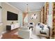 Elegant living room featuring stylish furnishings, hardwood floors, and modern decor at 301 Forsythia Ave, Summerville, SC 29483