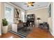 Bright home office features hardwood floors, large windows, a ceiling fan, and a bookshelf at 301 Forsythia Ave, Summerville, SC 29483