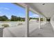 A spacious porch overlooks the community pool and common area, great for outdoor living and entertaining at 301 Forsythia Ave, Summerville, SC 29483