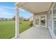 Enjoy scenic views from the back patio of this charming home with outdoor living space at 303 Sand Dune Trl, Summerville, SC 29486