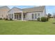 This home offers a spacious backyard, perfect for outdoor activities and relaxation at 303 Sand Dune Trl, Summerville, SC 29486