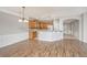 Kitchen featuring wood cabinets, granite counters, and modern appliances at 303 Sand Dune Trl, Summerville, SC 29486