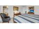 Bedroom featuring a four-poster bed, hardwood furnishings, and stylish accents at 3109 Hugh Bennett Dr, Johns Island, SC 29455