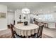 Open-concept home featuring a dining area that flows to the kitchen with a large island at 3109 Hugh Bennett Dr, Johns Island, SC 29455
