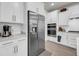 Modern kitchen showcases stainless steel appliances and bright white cabinetry with ample storage at 3109 Hugh Bennett Dr, Johns Island, SC 29455