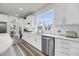 Modern kitchen features stainless steel appliances, white subway tile backsplash, and ample counter space at 3109 Hugh Bennett Dr, Johns Island, SC 29455
