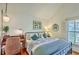 Well lit bedroom featuring a desk, bed, and ample sunlight from the window at 312 President St, Charleston, SC 29403