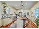 Modern kitchen with stainless steel appliances, a butcher block island, and ample counter space at 312 President St, Charleston, SC 29403