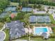 An aerial view shows the tennis courts, the pool, and the well-kept landscaping at 3125 Sturbridge Rd, Mount Pleasant, SC 29466