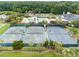 Aerial view of the tennis courts, the pool, and the playground at 3125 Sturbridge Rd, Mount Pleasant, SC 29466