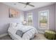 Comfortable bedroom with soft colors, white bedding, and natural light creating a cozy and inviting space at 3125 Sturbridge Rd, Mount Pleasant, SC 29466