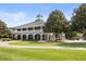 The clubhouse boasts a grand facade, promising luxurious amenities and picturesque views at 3125 Sturbridge Rd, Mount Pleasant, SC 29466