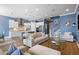 Open-concept living space with a modern kitchen, large island, and comfortable seating area at 3125 Sturbridge Rd, Mount Pleasant, SC 29466