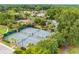 Aerial view of the community tennis courts surrounded by lush landscaping and mature trees at 3125 Sturbridge Rd, Mount Pleasant, SC 29466