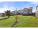 Spacious backyard featuring well-maintained lawn and a privacy fence at 324 Saucer Rd, Summerville, SC 29486
