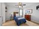Comfortable bedroom featuring carpet, a ceiling fan, and stylish decor at 324 Saucer Rd, Summerville, SC 29486