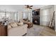 Bright and airy living room with fireplace, ceiling fan, and wood floors at 324 Saucer Rd, Summerville, SC 29486