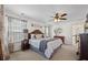 Spacious bedroom boasts neutral walls, ceiling fan, and ample natural light at 324 Saucer Rd, Summerville, SC 29486