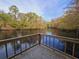 Scenic wood dock overlooking the river, perfect for enjoying the scenery at 3695 Cannon Rd, Round O, SC 29474