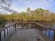 Scenic wood dock overlooking the river, perfect for enjoying the scenery at 3695 Cannon Rd, Round O, SC 29474