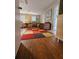 Cozy living room featuring hardwood floors and a colorful, patterned rug at 3695 Cannon Rd, Round O, SC 29474