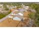 An aerial view showcases a neighborhood with well-maintained lawns and mature trees at 4045 Oxeye Loop, Johns Island, SC 29455