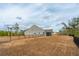 Large fenced backyard featuring a lush lawn and partial view of the home at 4045 Oxeye Loop, Johns Island, SC 29455