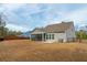 Fenced backyard with a covered patio and view of home's exterior at 4045 Oxeye Loop, Johns Island, SC 29455