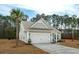 Charming single Gathering home with a well-manicured lawn and driveway at 4045 Oxeye Loop, Johns Island, SC 29455