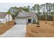 Charming single Gathering home with a well-manicured lawn and driveway at 4045 Oxeye Loop, Johns Island, SC 29455
