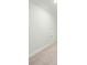Unfurnished room with neutral carpet and a small crawl space door at 4045 Oxeye Loop, Johns Island, SC 29455