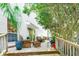 Relaxing back deck with comfortable seating and views of the serene backyard at 405 Springfield Rd, Mount Pleasant, SC 29464
