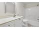 Bright bathroom with white vanity, tiled floors, a shower and bathtub combo, perfect for relaxation at 405 Springfield Rd, Mount Pleasant, SC 29464