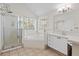 Bathroom features tiled floors, separate tub and shower, granite vanity, and large window at 405 Springfield Rd, Mount Pleasant, SC 29464