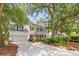 Beautiful two-story home with a spacious driveway, two car garage, and a manicured front lawn at 405 Springfield Rd, Mount Pleasant, SC 29464