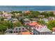 Picturesque aerial view of charming neighborhood homes with waterfront in the background at 41 Tradd St, Charleston, SC 29401