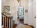 Inviting foyer featuring hardwood floors, staircase, and a glimpse into the living room at 41 Tradd St, Charleston, SC 29401