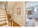 Bright hallway featuring a staircase and entrance into the living room at 41 Tradd St, Charleston, SC 29401