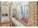 Open kitchen featuring white cabinets, stainless steel appliances, and views to the dining area at 41 Tradd St, Charleston, SC 29401