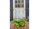 Charming window box with colorful flowers, complementing the home's exterior at 41 Tradd St, Charleston, SC 29401